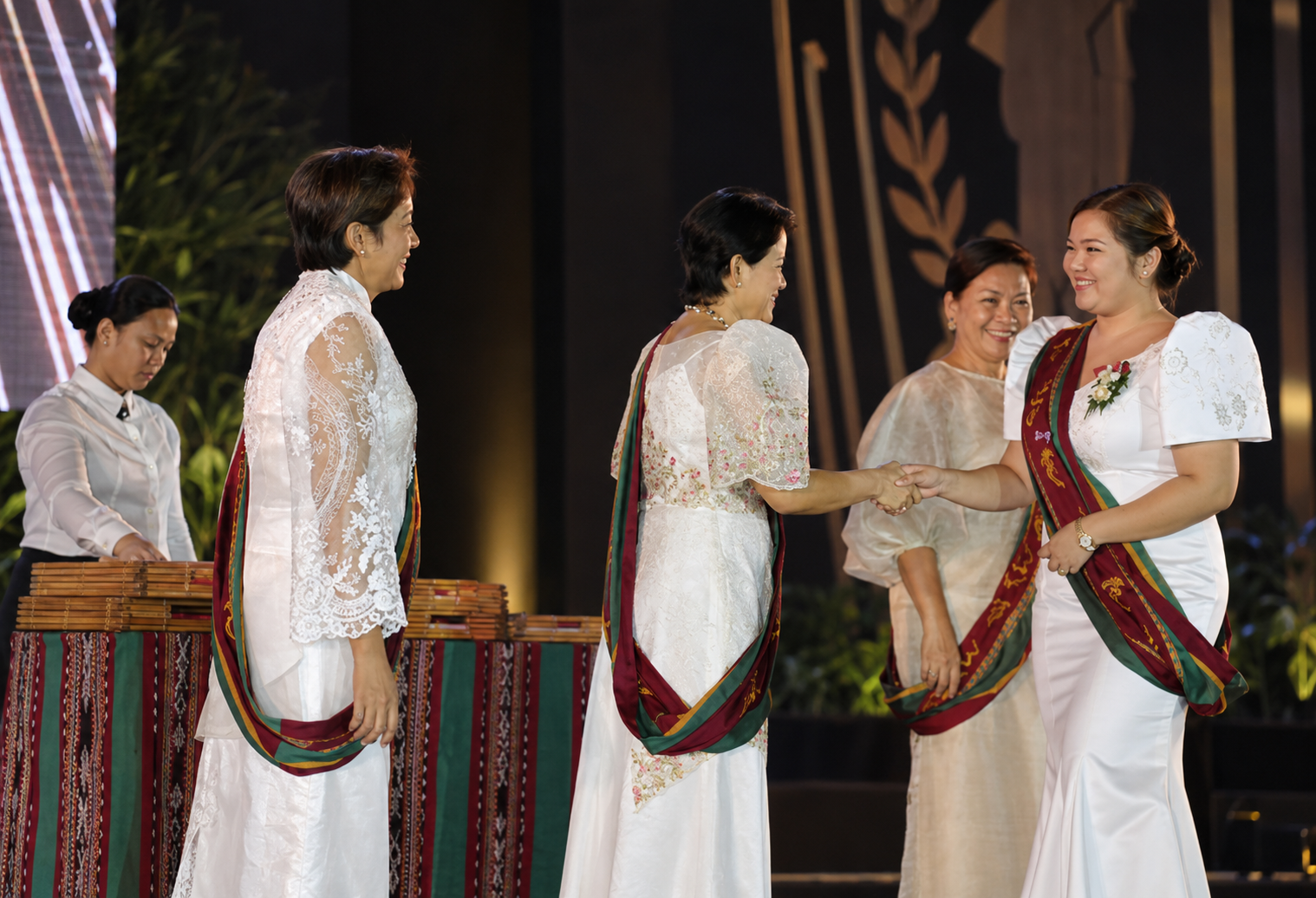 Handshake on stage during an academic ceremony